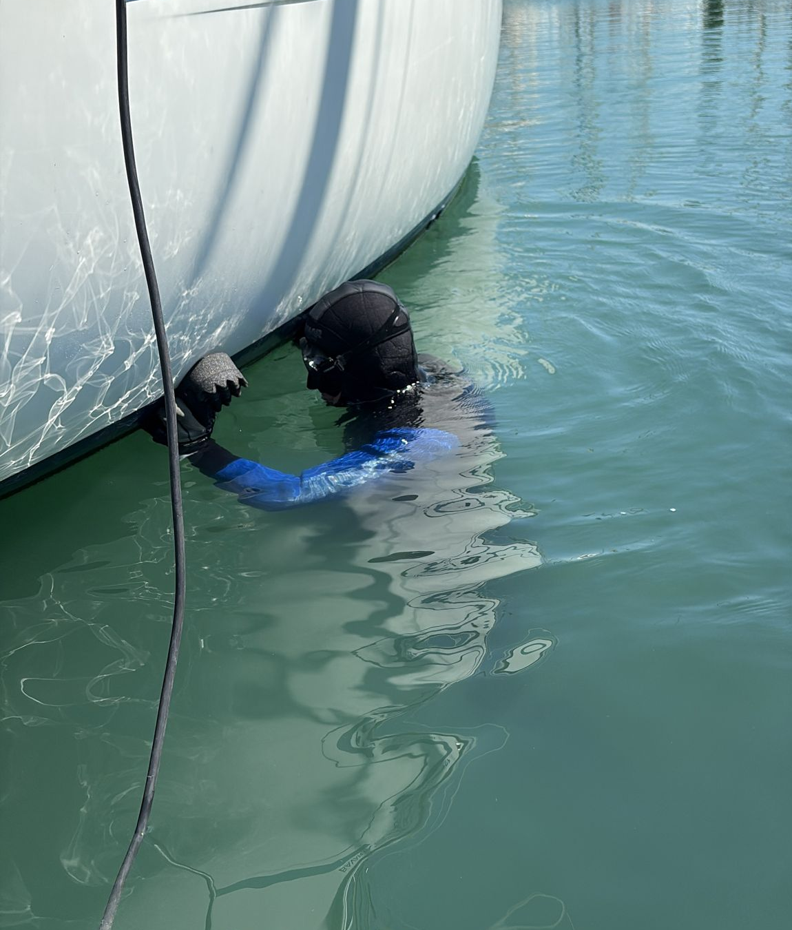 Up & Clean professional diver underwater